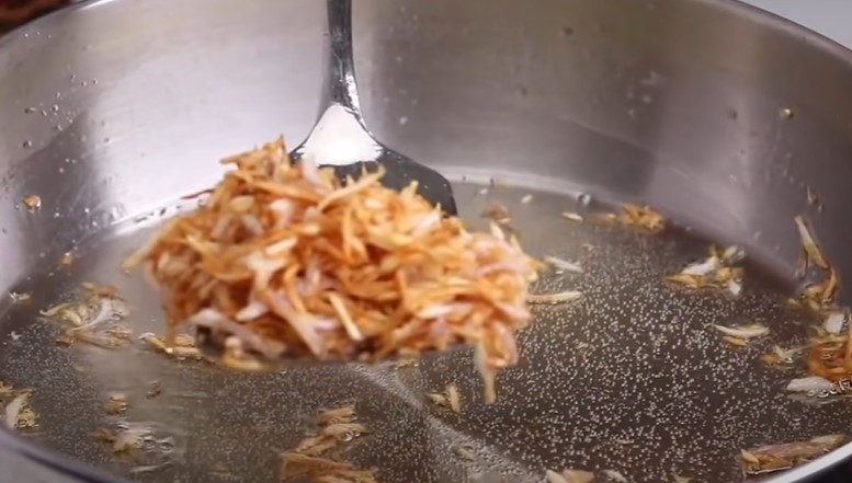 fry 2 cups chopped onion in hot oil