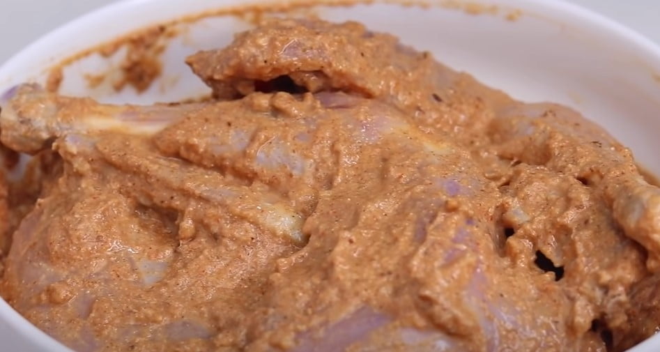 Marinate the chicken meat with one cup of sour curd, one teaspoon of chili powder, and one teaspoon of salt, and keep it for 1 hour
